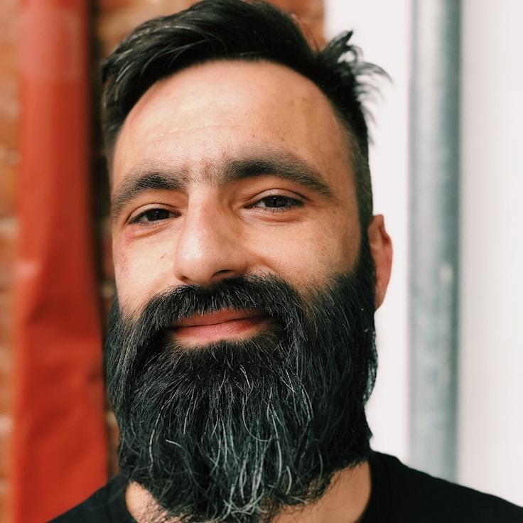 Ravi Kapoor, Client Relations Director, discussing corporate gifting strategy with business clients